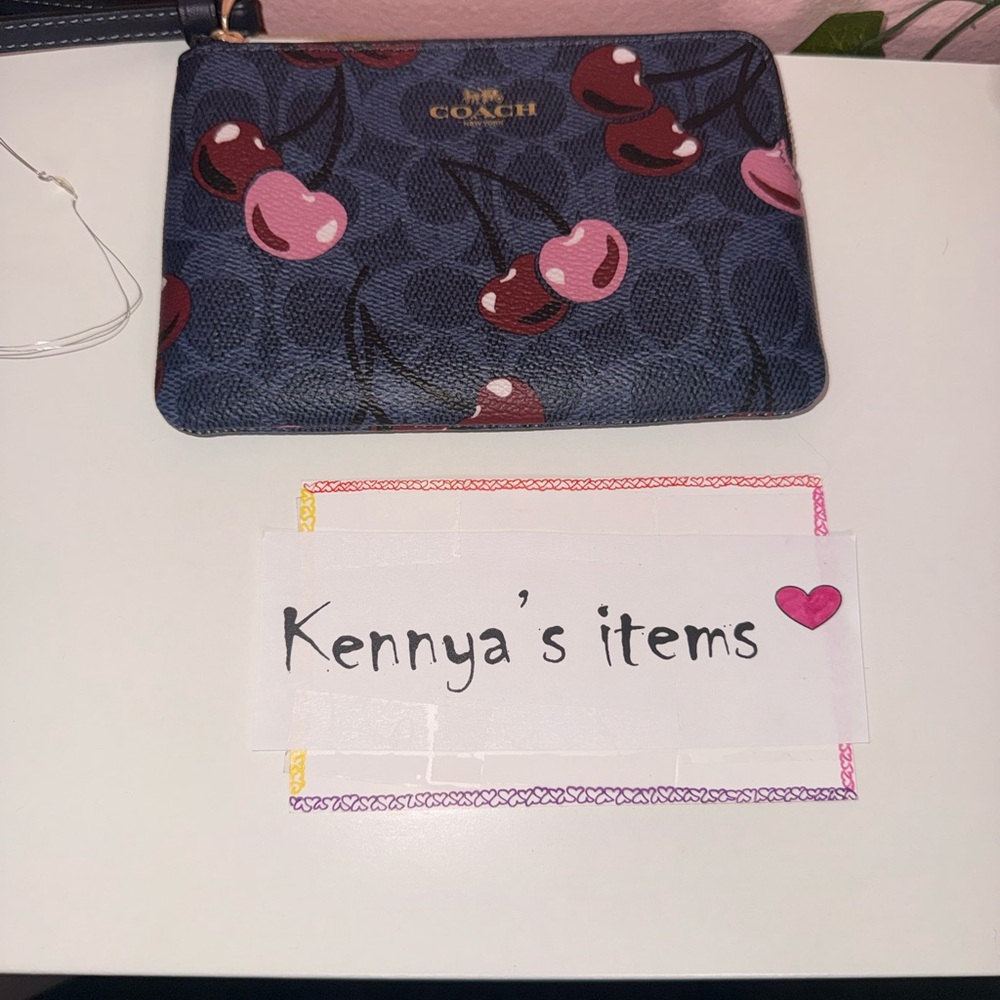 Corner zip wristlet in blue cherry print